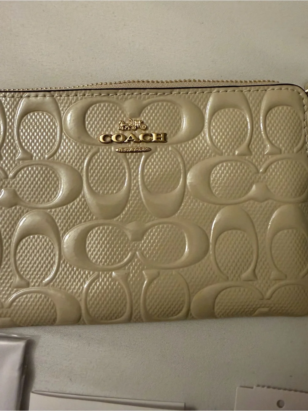 Coach wristlet cream